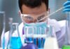 Animals Found to Digest Nature’s Original Bioplastic Scientist pipetting blue liquid into test tubes
