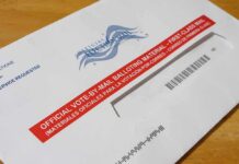 Late Ballots Crush Spencer Pratt’s Runoff Hopes Mail-in ballot envelope with red label on wooden table