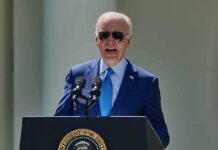 Hunter Biden Says His Father’s Cancer Has Spread man in blue suit speaking at a podium with presidential seal