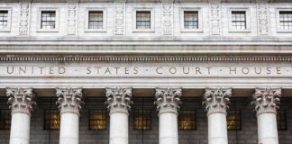 Founder Reported Epstein to FBI, Lawsuit Claims United States courthouse facade with Corinthian columns