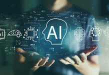 AI Extinction Fears Called a “Mind Virus” Person holding virtual icons related to artificial intelligence.