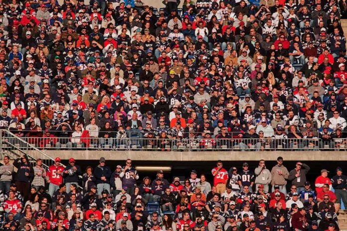 shutterstock_133676561 Peter Keys in a large stadium crowd of football fans