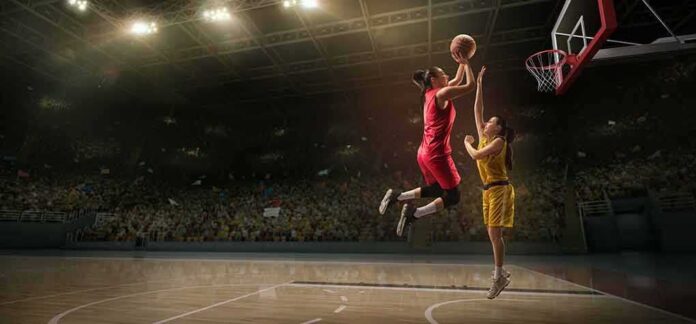 shutterstock_1411326926-1 Two women playing basketball; Michelle Jenneke is not visible