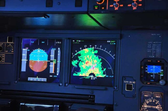 shutterstock_1588491106-1 aircraft cockpit displays with attitude indicator and weather radar