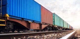 Texas Declares Statewide Diesel Emergency Freight train with colorful shipping containers on railway tracks