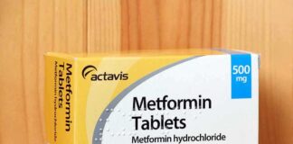 Metformin tablets box on wooden surface