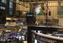 Worst September Start Since 2008 NYSE trading floor with monitors and tickers