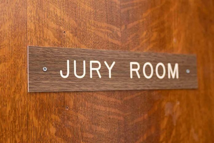 shutterstock_1826203295-1 Jury room sign on a wooden door