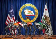 TikTok Hit: Alabama Extracts Nine Figures Press microphones at a podium before California governor seal