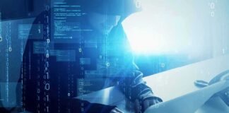 Safety Concerns Slow OpenAI’s Next Model Hooded figure using a laptop with digital code overlay