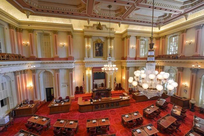 shutterstock_207305371 Legislative chamber with red carpet and chandeliers