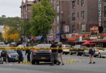 Key Moments Remain Off Camera Police investigate a taped-off urban street crime scene