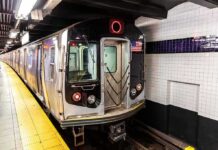 Subway Gun Discharge Injures Two Subway train stopped at an underground station platform
