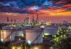 Trump Calls for End to Refinery Attacks Oil refinery with storage tanks at sunset