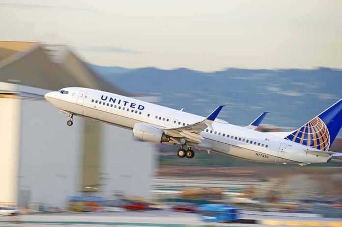 shutterstock_548200165 Airplane taking off from runway