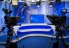 Journalist: Captive Footage Was Withheld A television studio setup with cameras and a blue backdrop