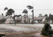 Live Footage Shows Hurricane Winds in Destin Houses battered by hurricane winds and flooding
