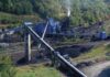 Winter Fuel Rush Tightens Asian Coal Supply Coal processing plant with conveyor belts in a forested valley