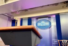 News Outlet Revises Story After White House Ultimatum Podium in White House press briefing room