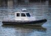 Maryland Father Found Dead in Cuyahoga River Police patrol boat on calm water
