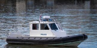 Police patrol boat on calm water
