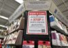 $963K Trading Card Heist Shocks Collectors Gift card display with scam warning sign