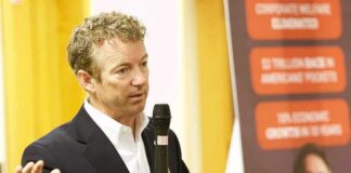 Pollsters Panic: Midterm Poll Accuracy Under Fire Rand Paul speaking with a microphone during an indoor event