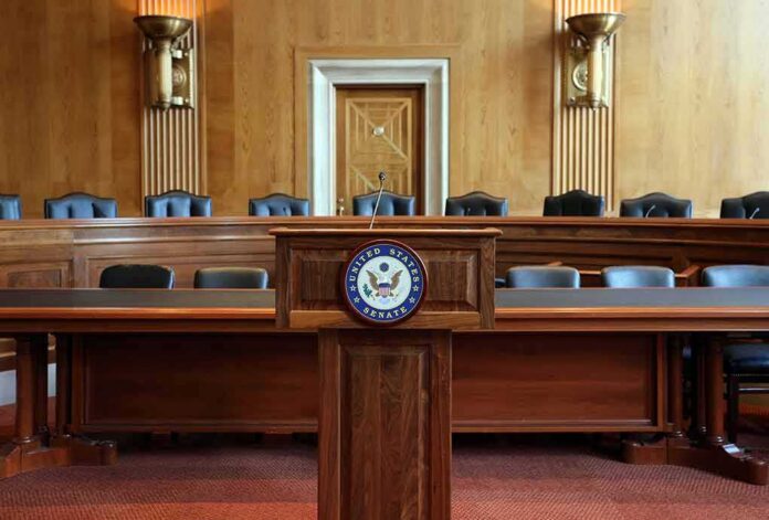 shutterstock_686344315 U.S. Senate hearing room podium with microphone